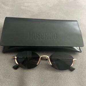 Moschino oval sunglasses